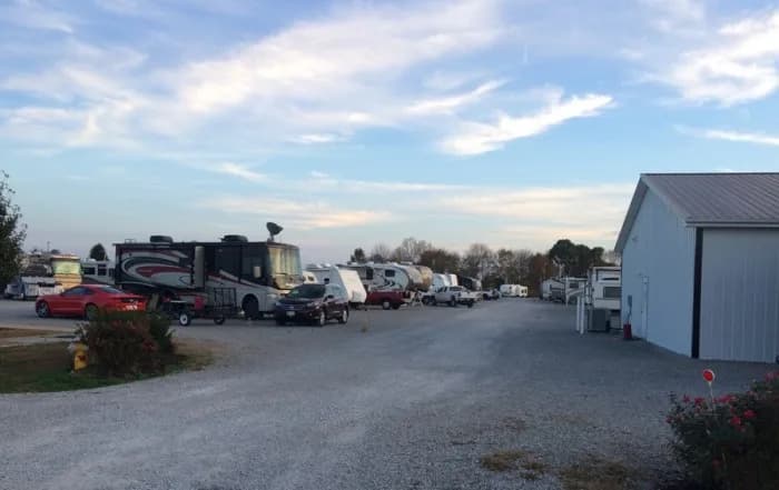 Afternoon view of RV rows and the office building at Heartland RV Park